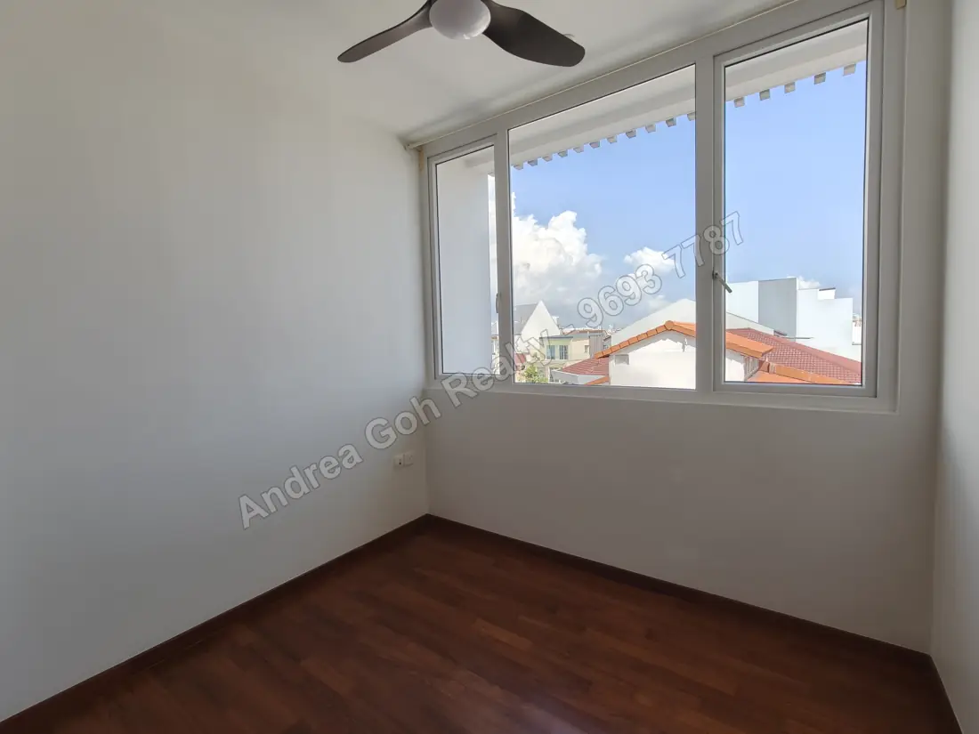 Bedroom as-is, north-facing outlook over low-rise landed